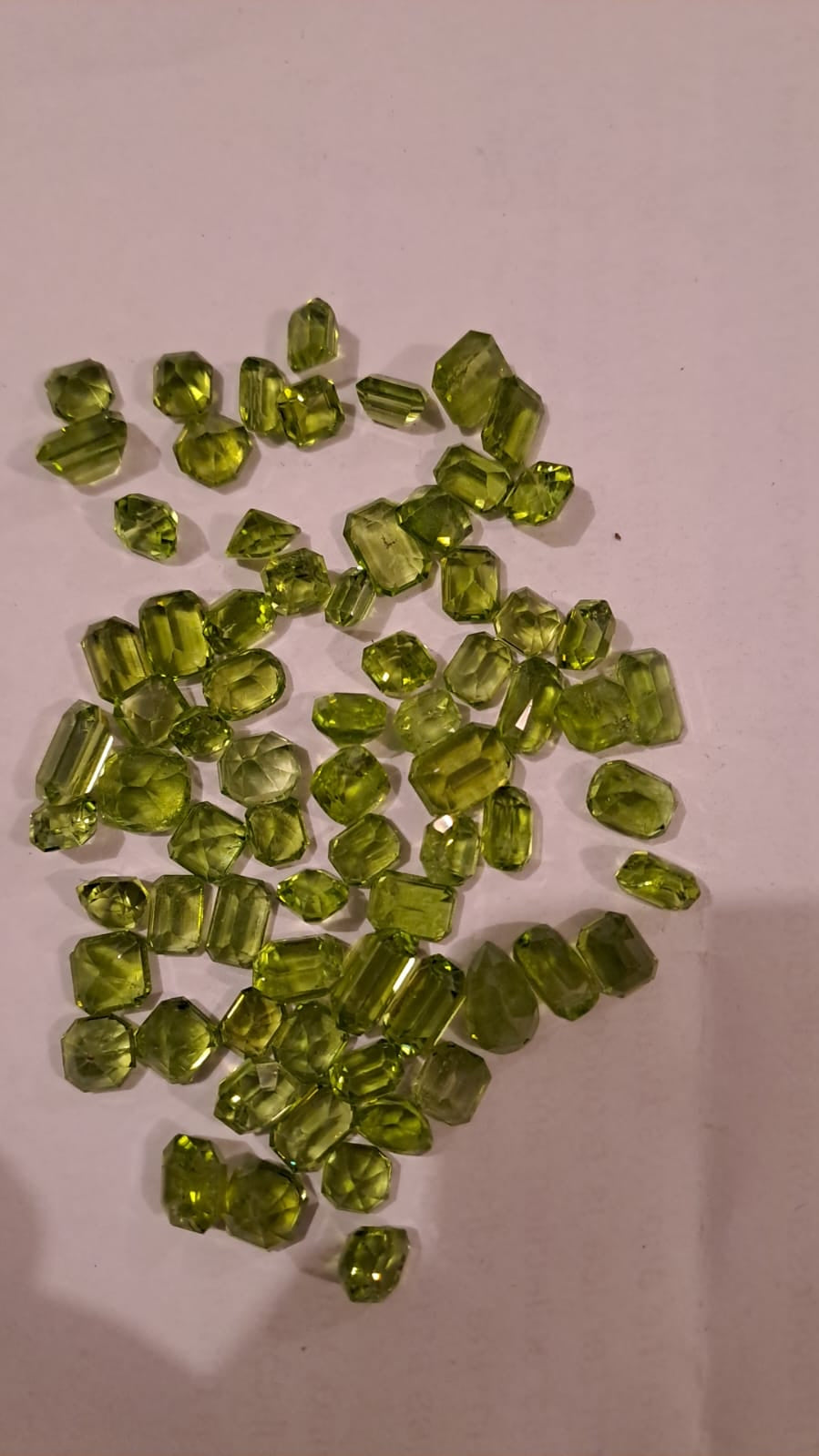 Natural faceted Peridots for wholesale